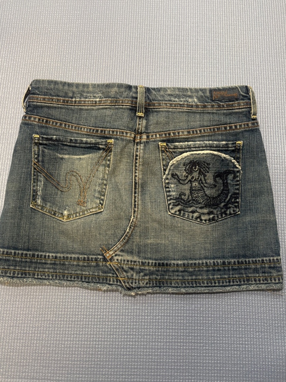 Citizens Of Humanity Distressed Denim Mini Skirt in Medium Blue Wash